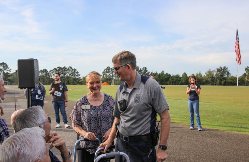 Santa Fe Police Chief Ed Book thanks a few residents from The Windsor Assisted Living Home for participating in&nbsp;the Fourth Annual "Run With The Cops" walk at the Santa Fe track&nbsp;Thursday&nbsp;morning.