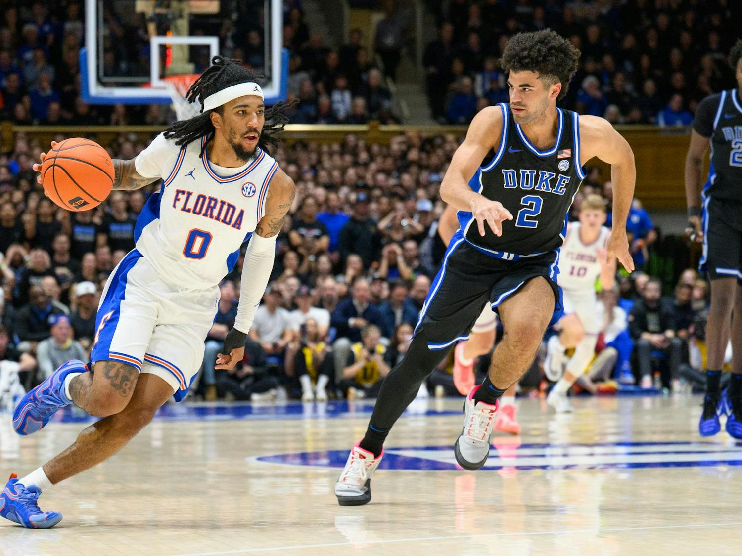Florida guard Boogie Fland (0) excelled in the final minutes against Duke, scoring the Gators' final four field goals before a costly turnover gave the Blue Devils the win.