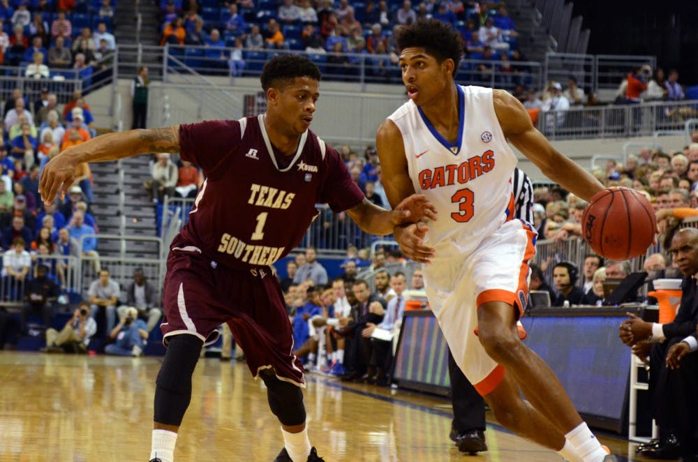 Freshman Devin Robinson drives into the paint during Florida's 75-50 win against Texas Southern on Friday in the O'Connell Center.