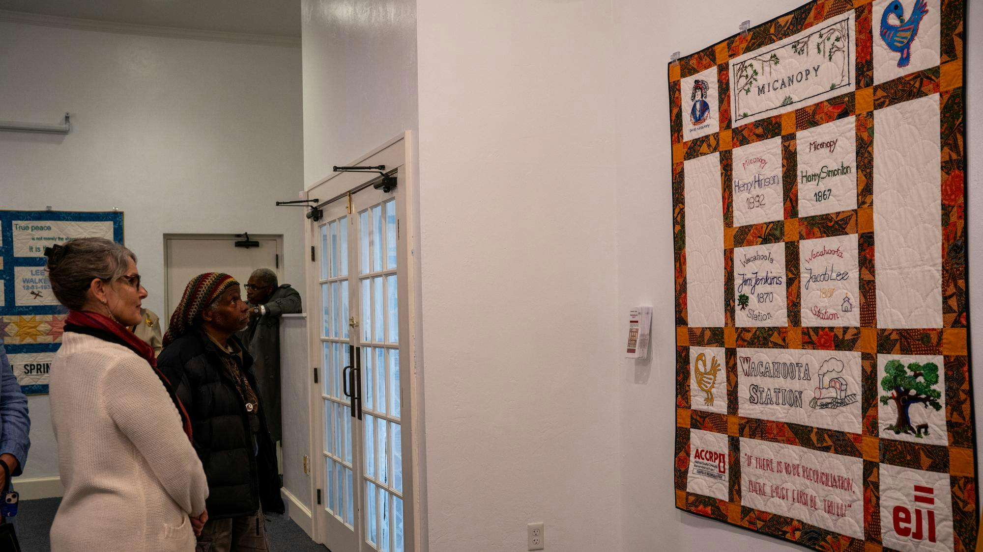 Onlookers view the lynch remembrance quilts at Matheson History Museum in Gainesville, Fla., Wednesday, Jan. 21, 2026. 