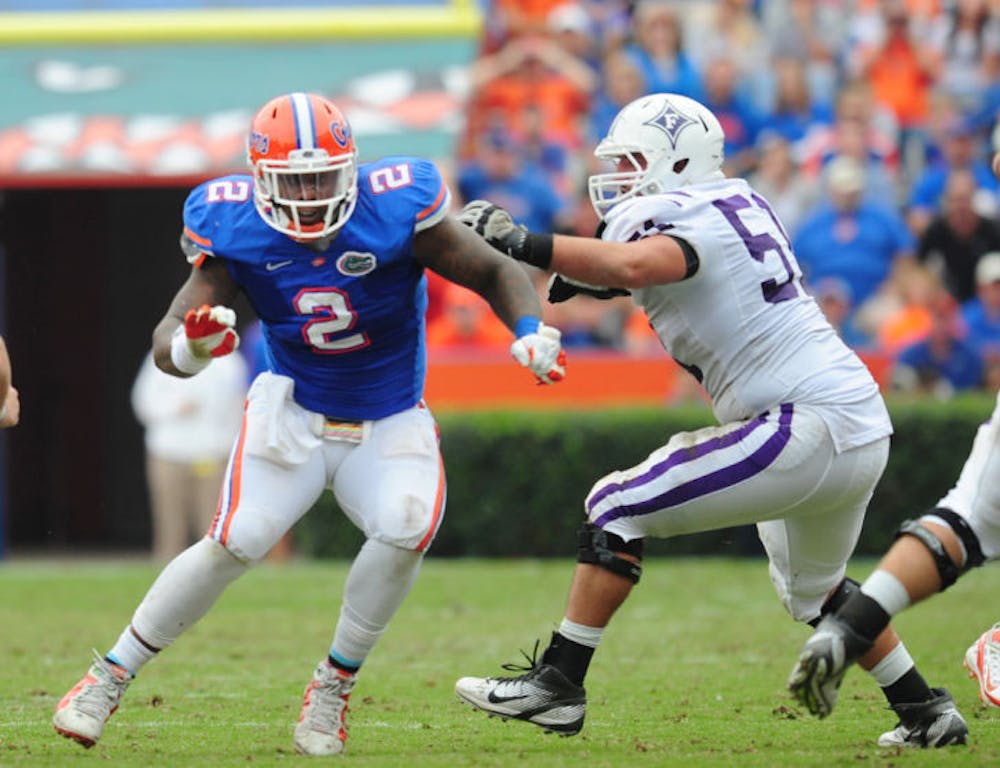 <p>Defensive tackle Dominique Easley (2) rushes the quarterback during Florida’s 54-32 win against Furman on Nov. 19, 2011, in Ben Hill Griffin Stadium.</p>
