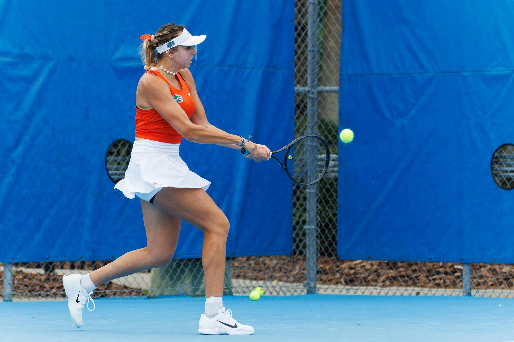 Florida's Lucie Pawlak returns during an NCAA tennis match against Mississippi State’s Mia Robinson, Saturday, March 28, 2026, in Gainesville, Fla.