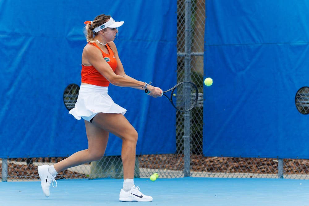 Florida's Lucie Pawlak returns during an NCAA tennis match against Mississippi State’s Mia Robinson, Saturday, March 28, 2026, in Gainesville, Fla.