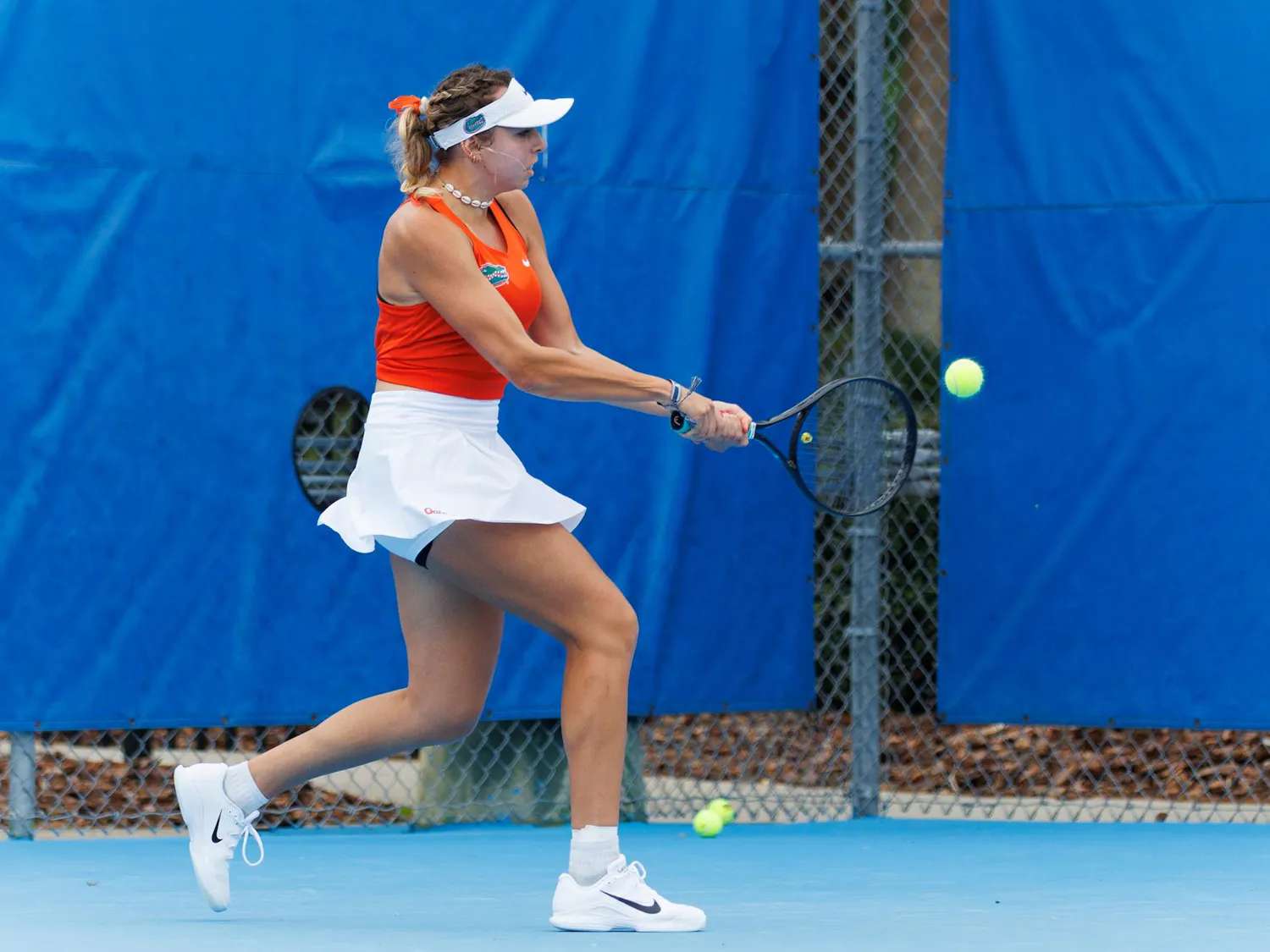 Florida's Lucie Pawlak returns during an NCAA tennis match against Mississippi State’s Mia Robinson, Saturday, March 28, 2026, in Gainesville, Fla.