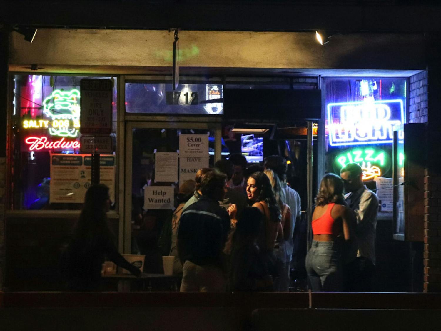 A group is seen waiting to enter Salty Dog Saloon, located off of West University Avenue at Midtown Friday night, Oct. 2, 2020. (Chasity Maynard/Alligator Contributor)