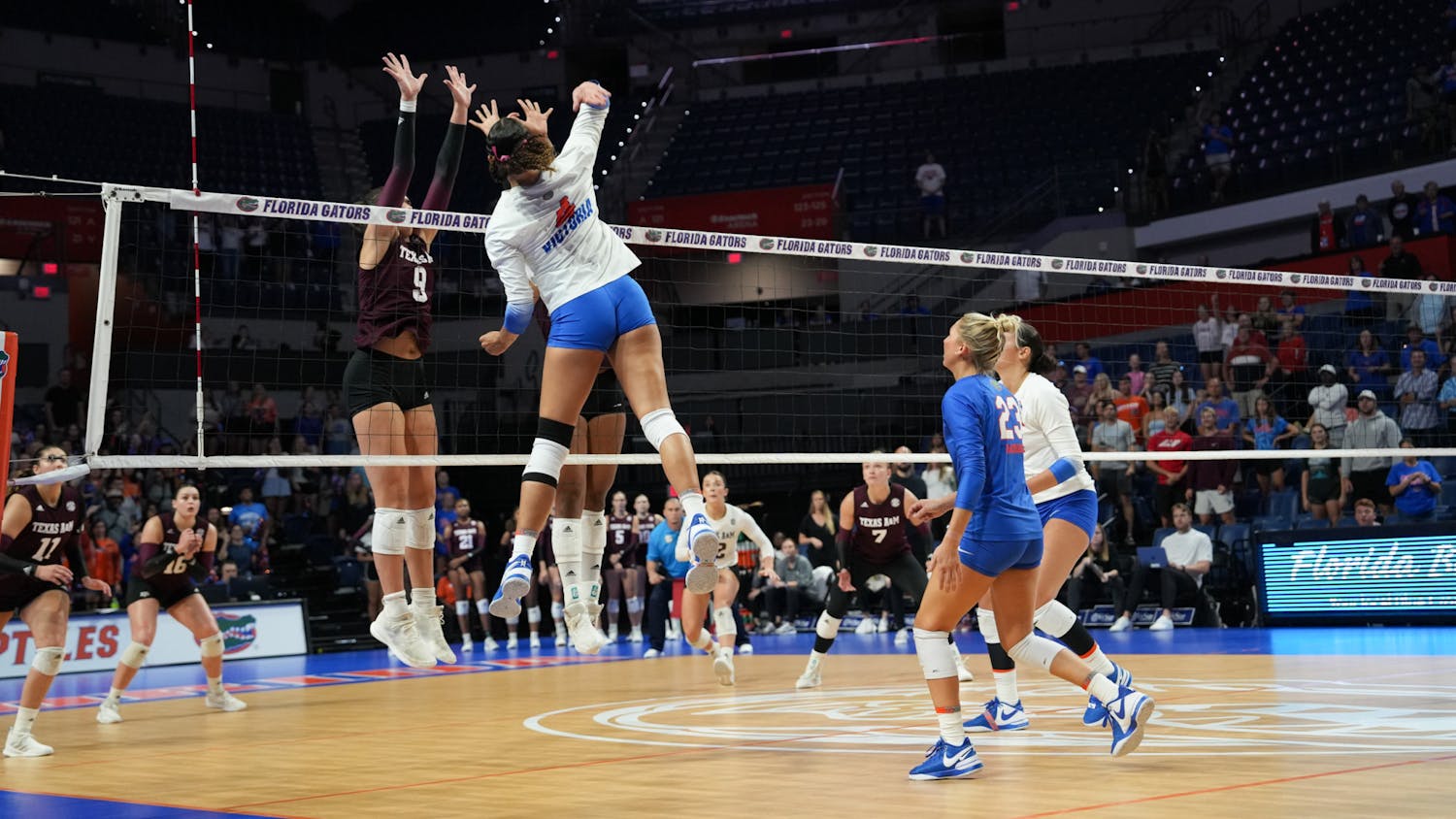 Senior outside hitter Sofia Victoria spikes the ball in the Gators' 3-2 loss against the Texas A&M Aggies on Wednesday, Sept. 27, 2023.