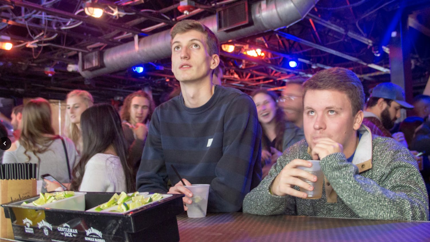 Grant Howard, a 21-year-old UF statistics junior, and Thomas DePaola, a 21-year-old UF applied physiology and kinesiology junior, drink at Fat Daddy’s Tuesday night during the pub crawl for Wyatt Fulghum. Although neither student knows Fulghum personally, they were happy that they could contribute to the treatment for Fulghum’s stage four brain cancer. “It’s a great reason to go out,” Howard said.