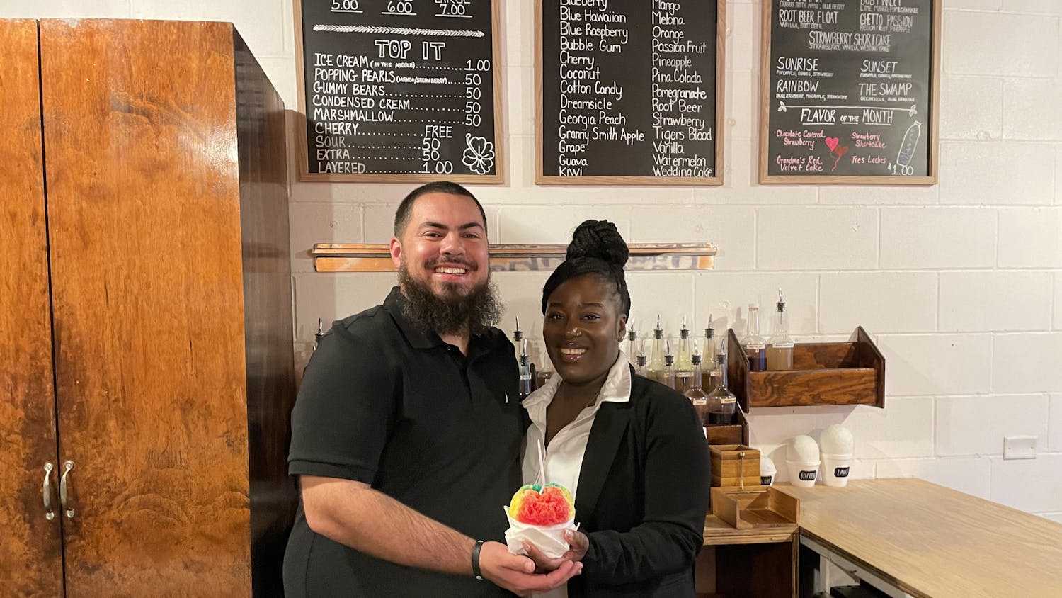 Cody Sheppard and Kichelle Sheppard pose in their store, Charlie’s Snow Shack, on Feb. 3, 2025.