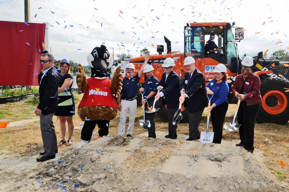 <p><span>City and Wawa officials hoist a ceremonial shovel of dirt during the groundbreaking ceremony for one of five Wawa locations opening up in Gainesville in the next year.</span><span> </span></p>