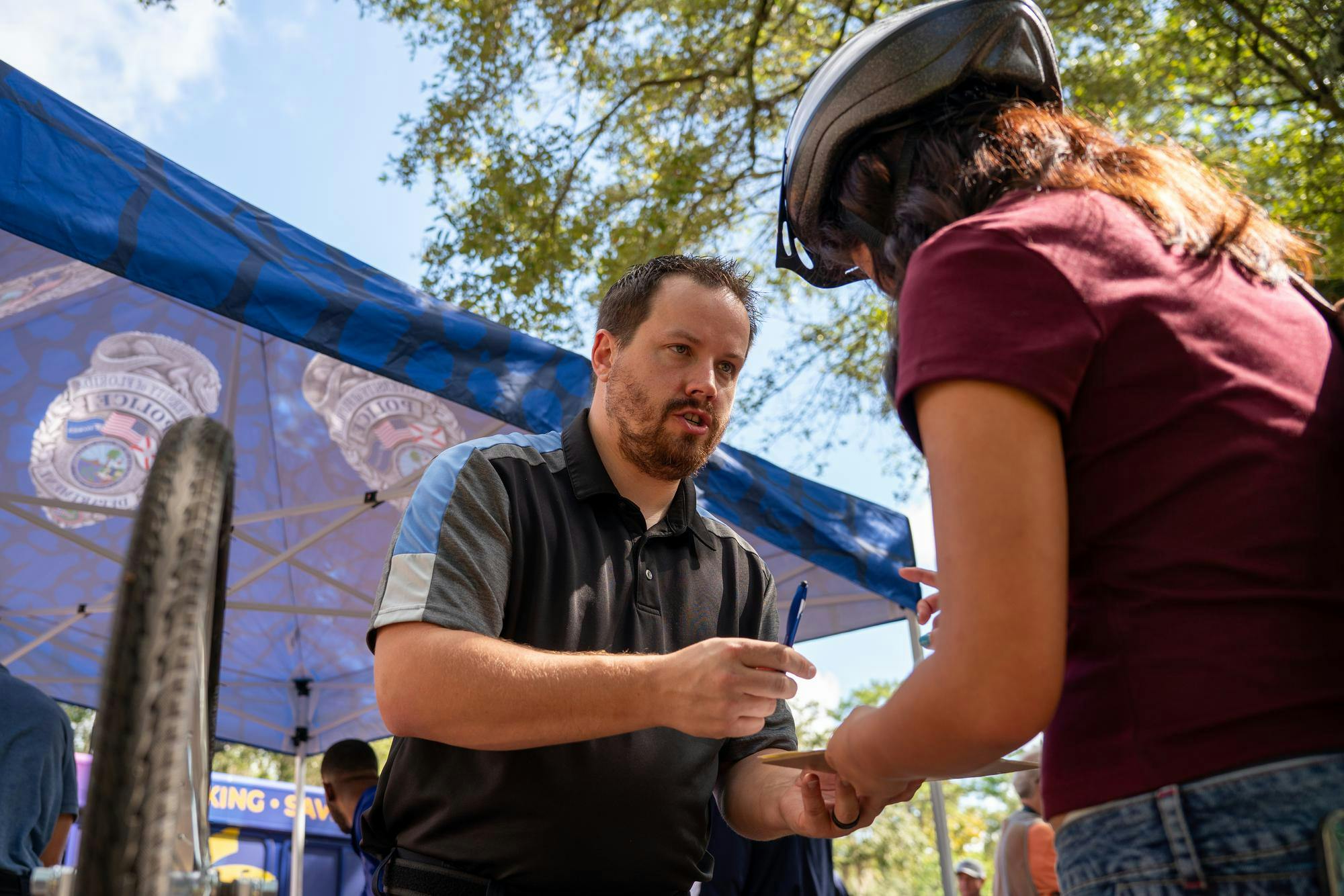 Kyle Ostendorf registers a bike for a UF student at the Newell Gateway, Monday, Aug. 31, 2026, in Gainesville, Fla.
