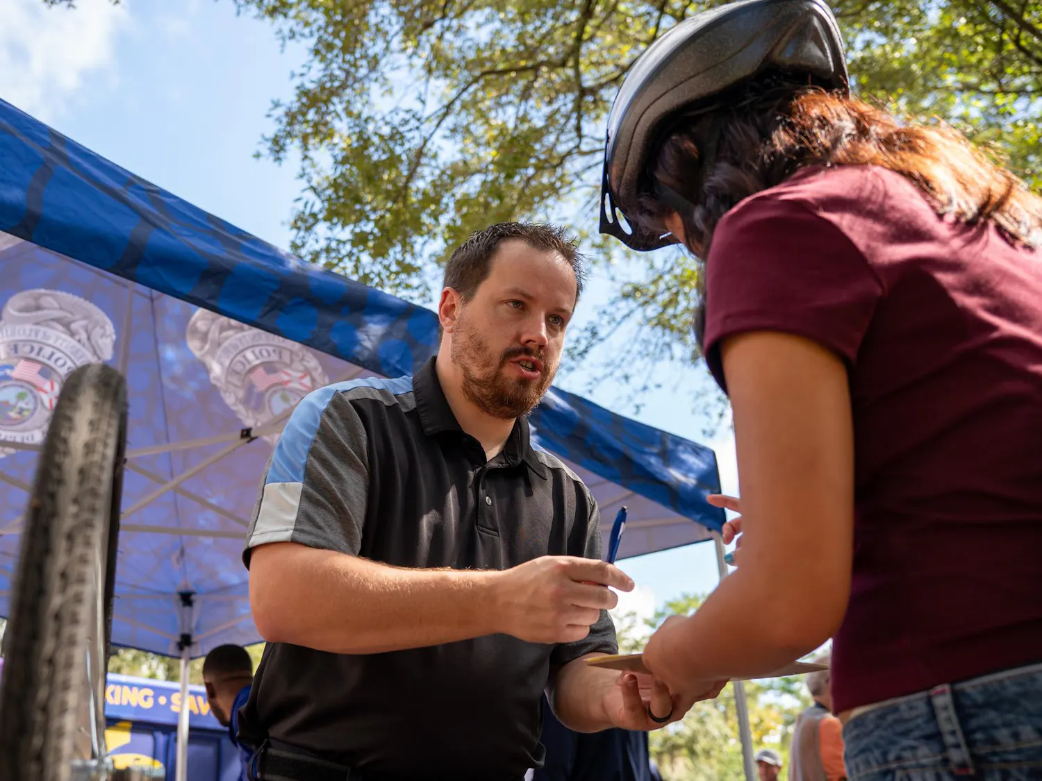 Kyle Ostendorf registers a bike for a UF student at the Newell Gateway, Monday, Aug. 31, 2026, in Gainesville, Fla.