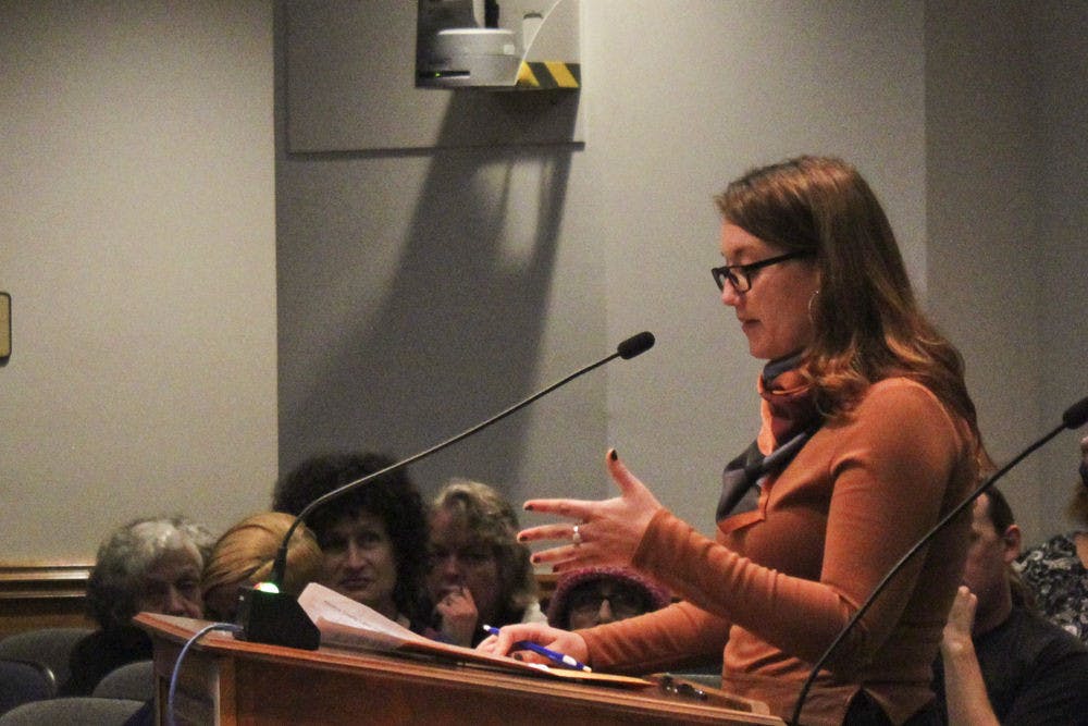 Lauren Byers, a 24-year-old UF history senior, speaks during a city commission meeting on Thursday evening. Byers said she was disappointed with Mayor Ed Braddy’s response to the Alachua County Labor Coalition’s demand for a $15 minimum wage.
