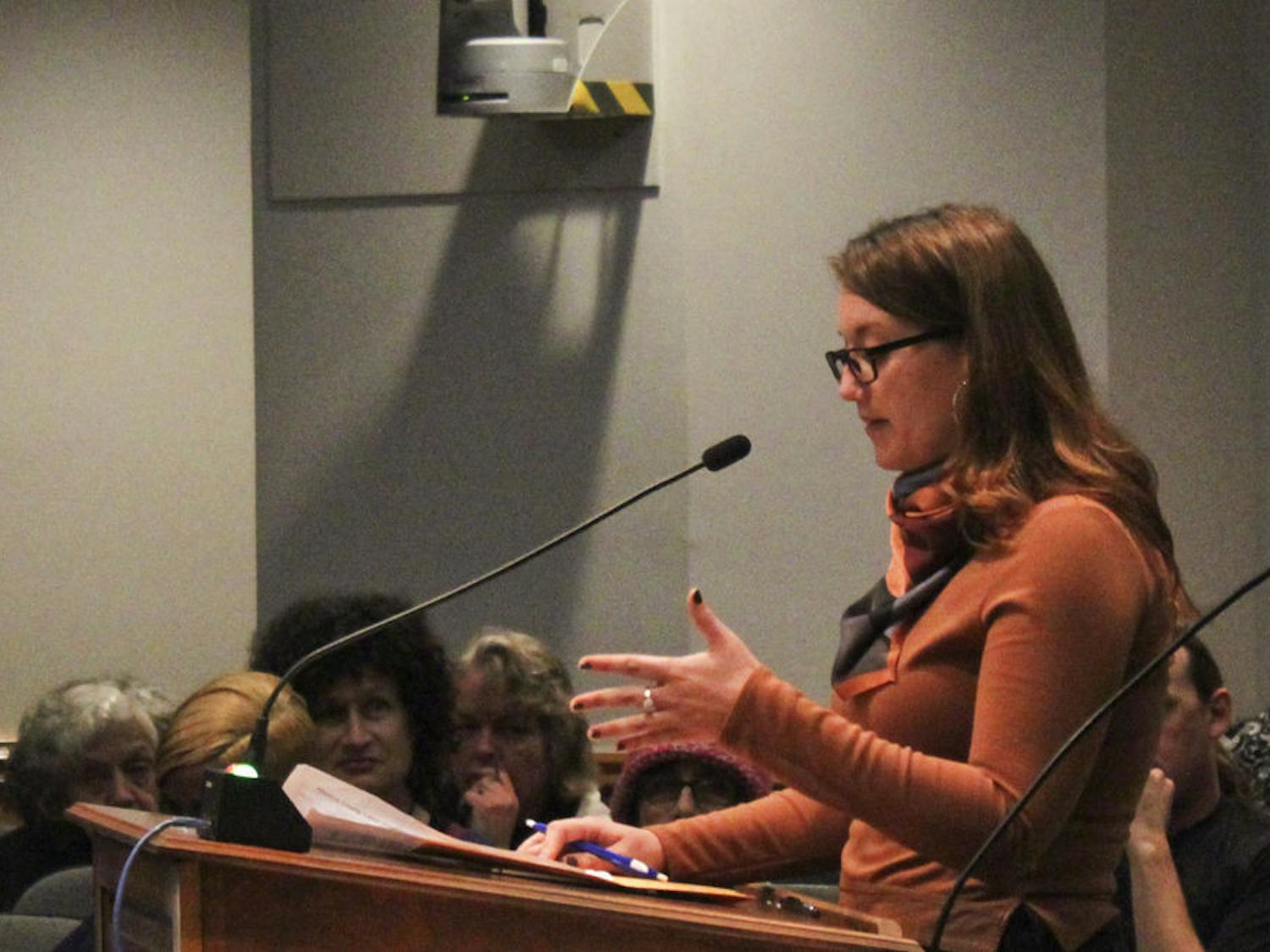 Lauren Byers, a 24-year-old UF history senior, speaks during a city commission meeting on Thursday evening. Byers said she was disappointed with Mayor Ed Braddy’s response to the Alachua County Labor Coalition’s demand for a $15 minimum wage.