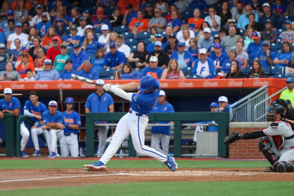 Florida pitcher Jac Caglianone swings hit bat during the Gators' 2-1 win against the Georgia Bulldogs Saturday, April 15, 2023.