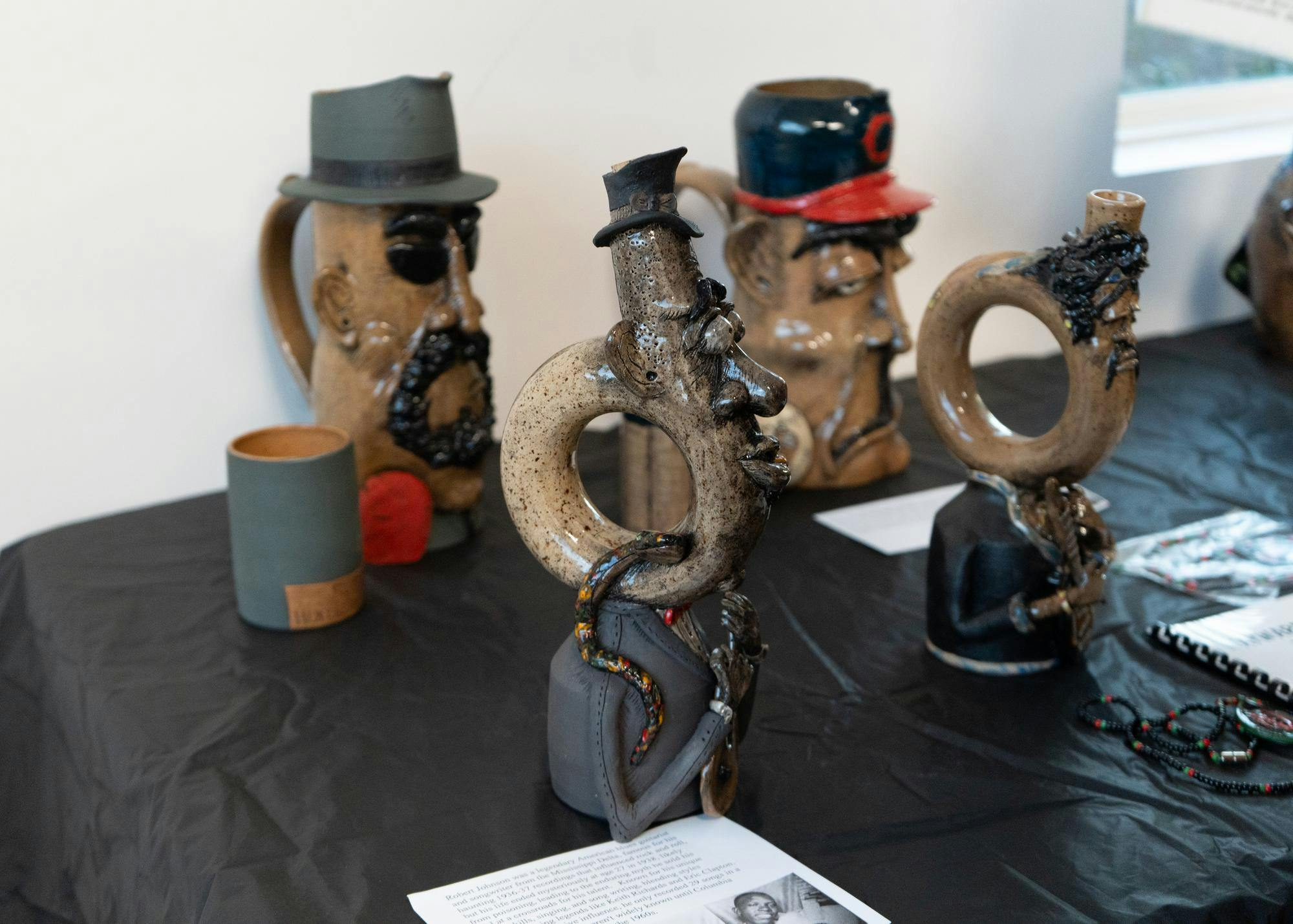 Pottery by Randy Adams sits on display at the Oakview Community Center for the Celebration of Black Love, Art, and Poetry event, Saturday, Feb. 7, 2026, in Gainesville, Fla.