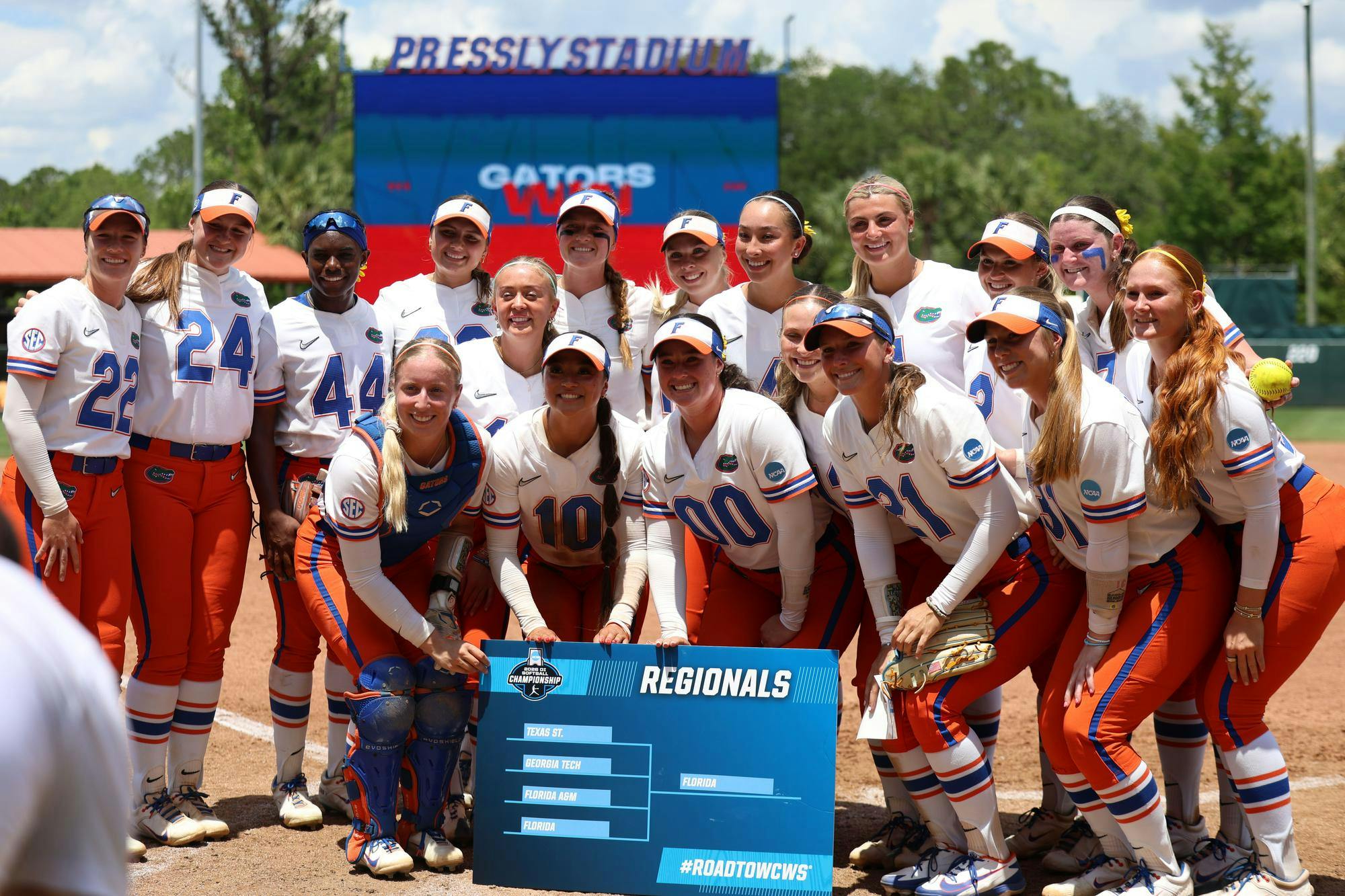 Florida's Softball team poses with the regionals bracket sign after winning their NCAA Regional softball game against Georgia Tech, Sunday, May 17, 2026, in Gainesville, Fla. 