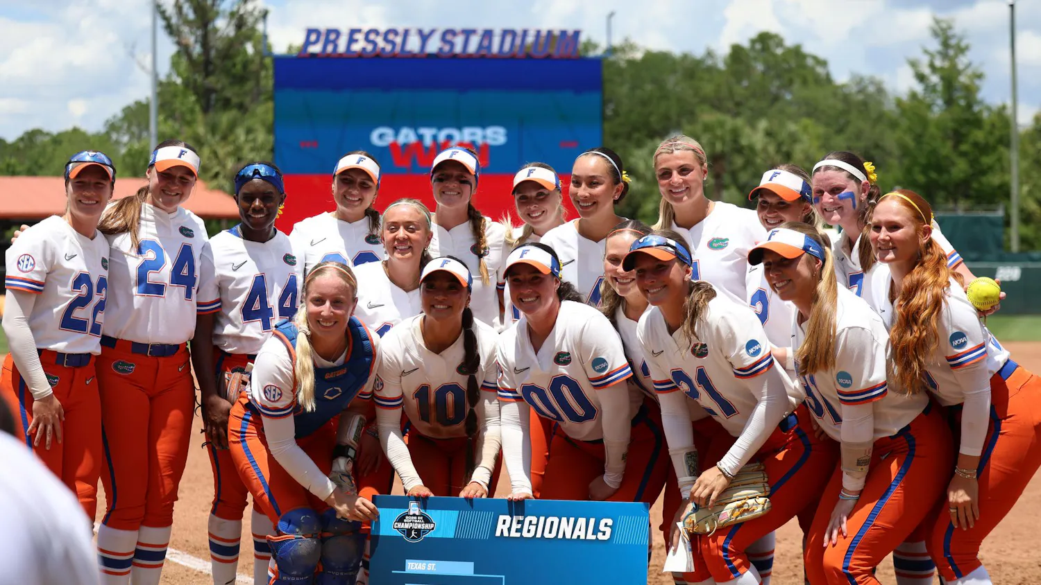 Florida's Softball team poses with the regionals bracket sign after winning their NCAA Regional softball game against Georgia Tech, Sunday, May 17, 2026, in Gainesville, Fla.