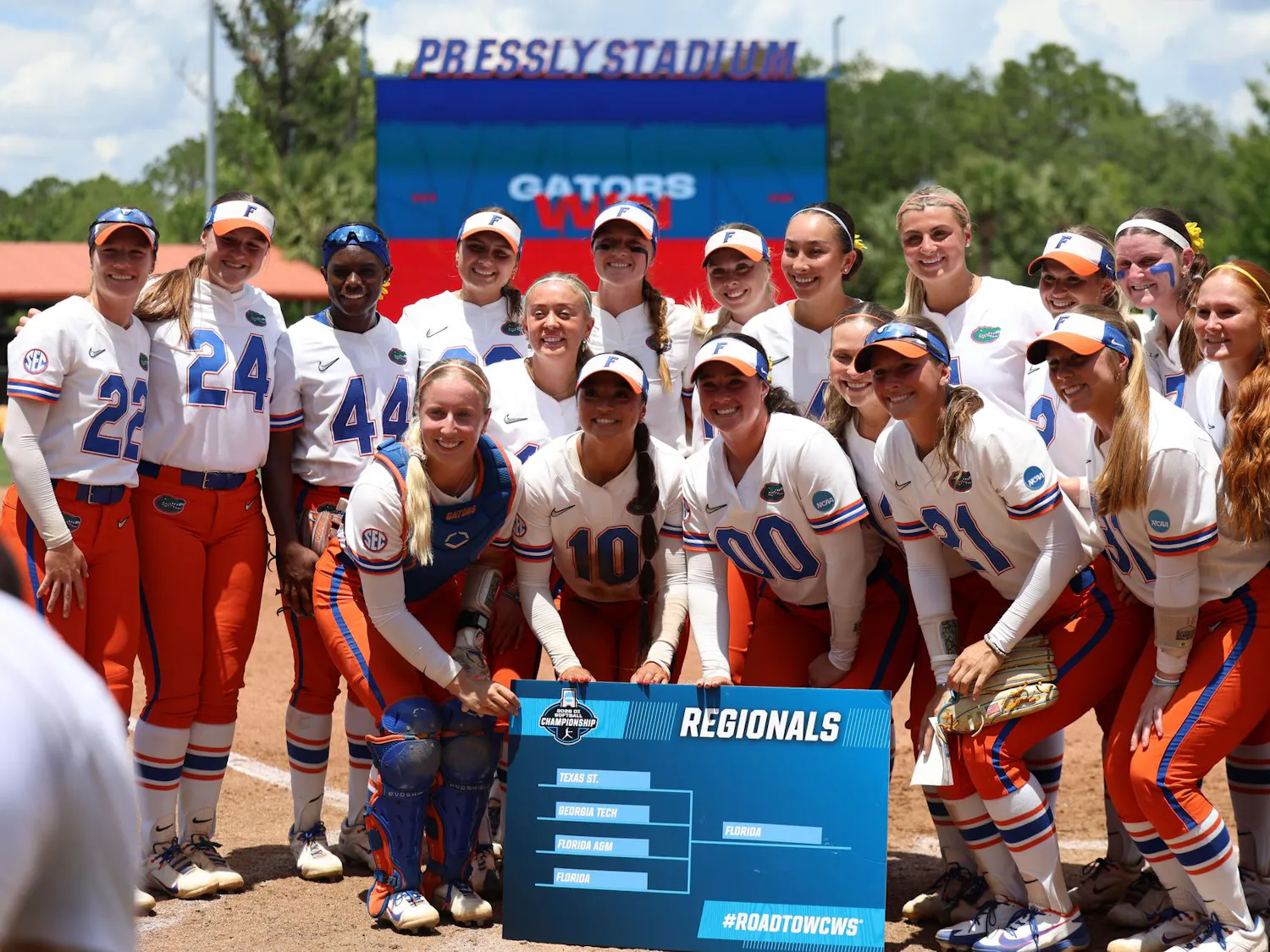 Florida's Softball team poses with the regionals bracket sign after winning their NCAA Regional softball game against Georgia Tech, Sunday, May 17, 2026, in Gainesville, Fla.
