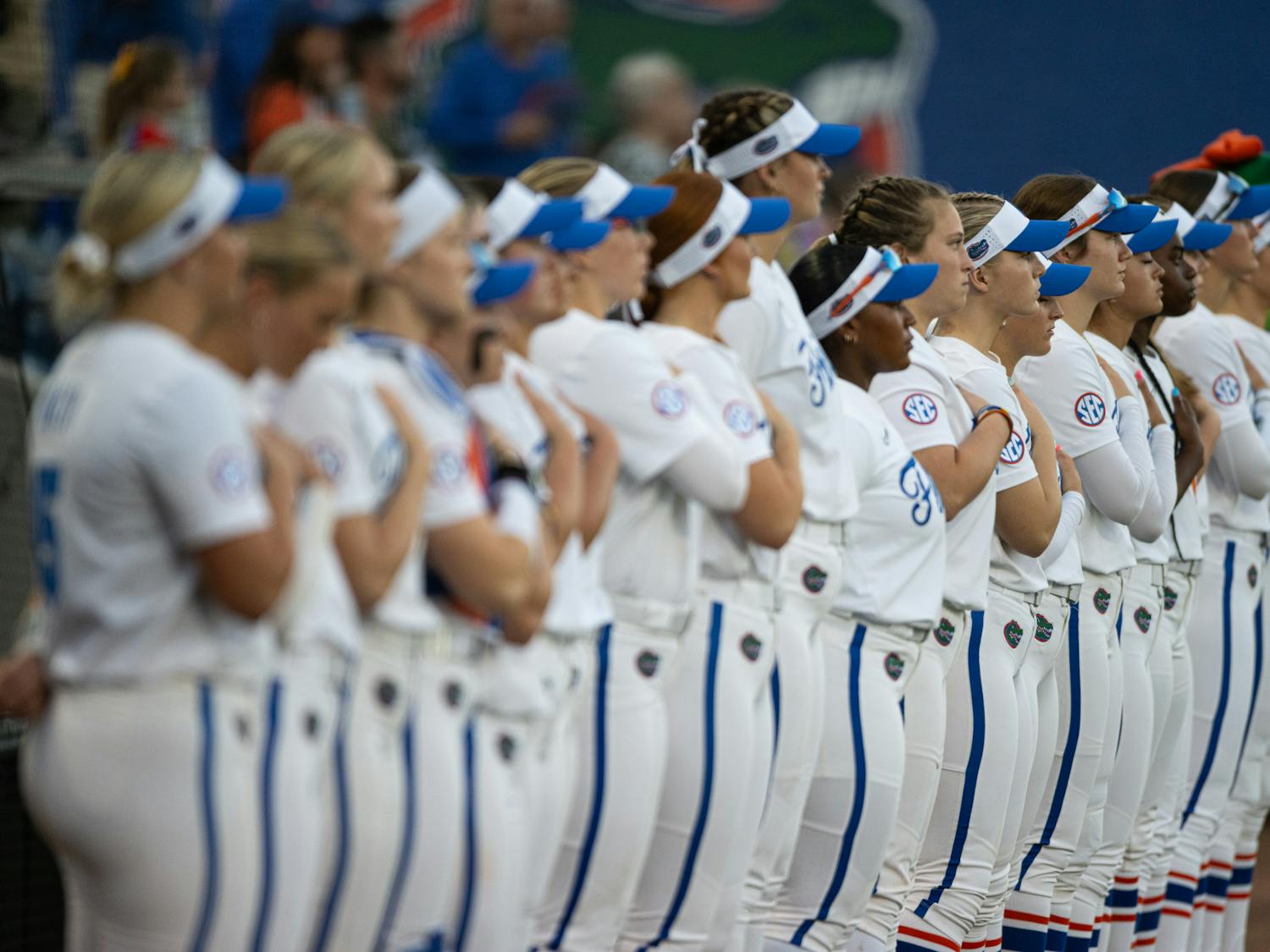 The Florida Gators women’s softball team stands for the national anthem before their home opener at Katie Seashole Pressly Stadium against North Florida on Feb. 6, 2025.