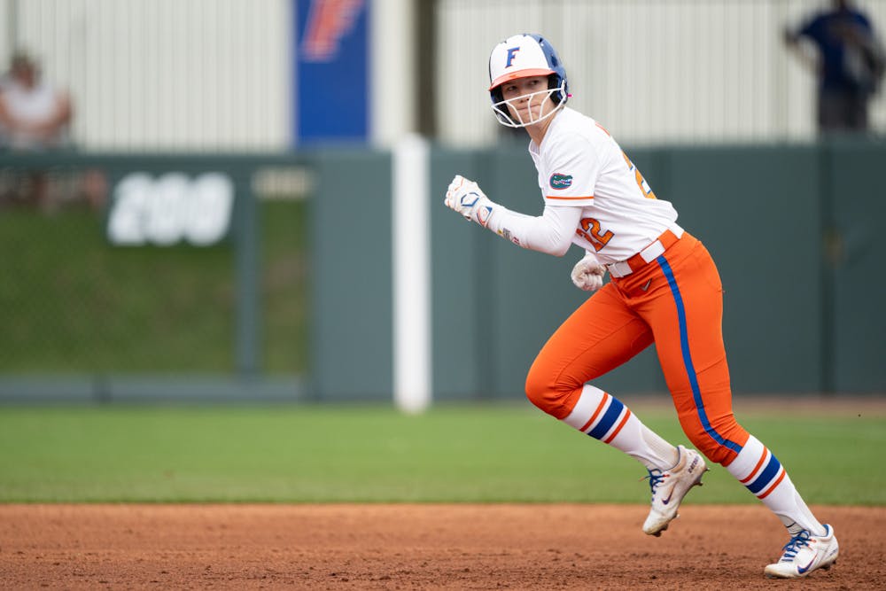 Florida Gators outfielder Cassidy McLellan (22) prepares to steal second in a softball game against Providence in Gainesville, Fla., on Friday, Feb. 14, 2025.