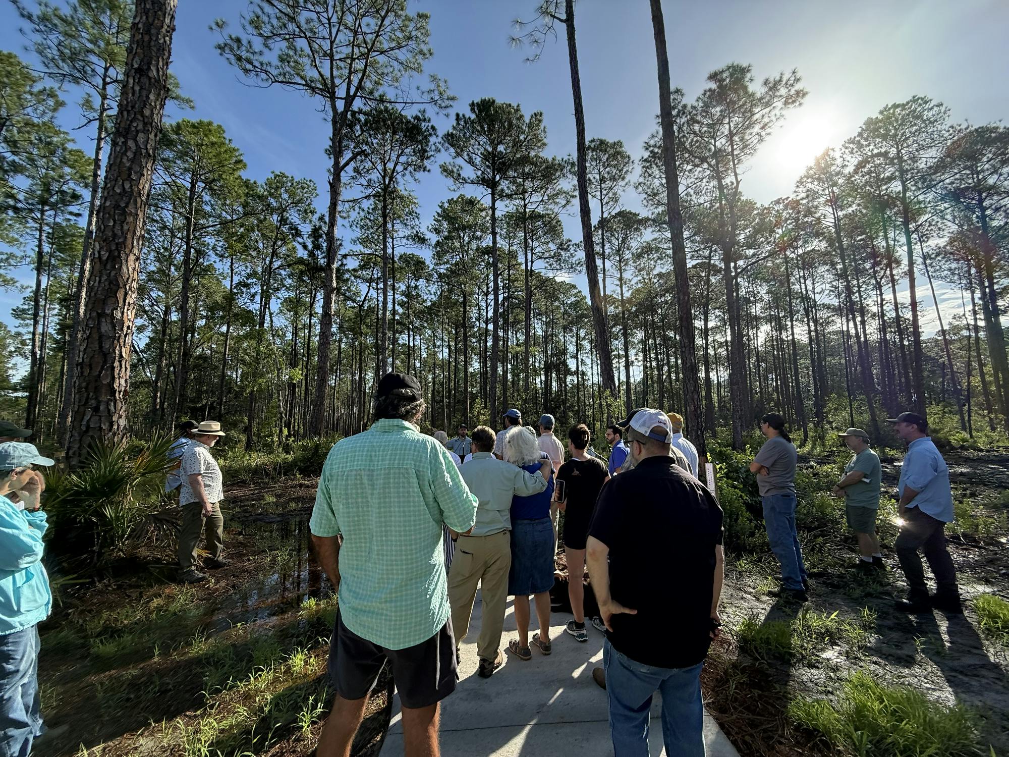 People attend the Black Lake Preserve Ribbon Cutting, Friday, August 21, 2026, in Melrose, Fla.
