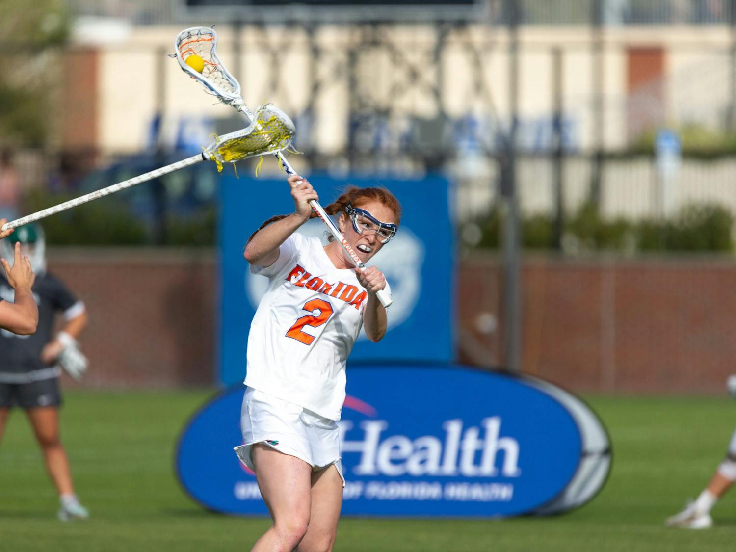 Senior midfielder Madison Waters goes to pass the ball in the Florida lacrosse team's 21-4 win over Jacksonville University on Wednesday, February 28, 2024. 