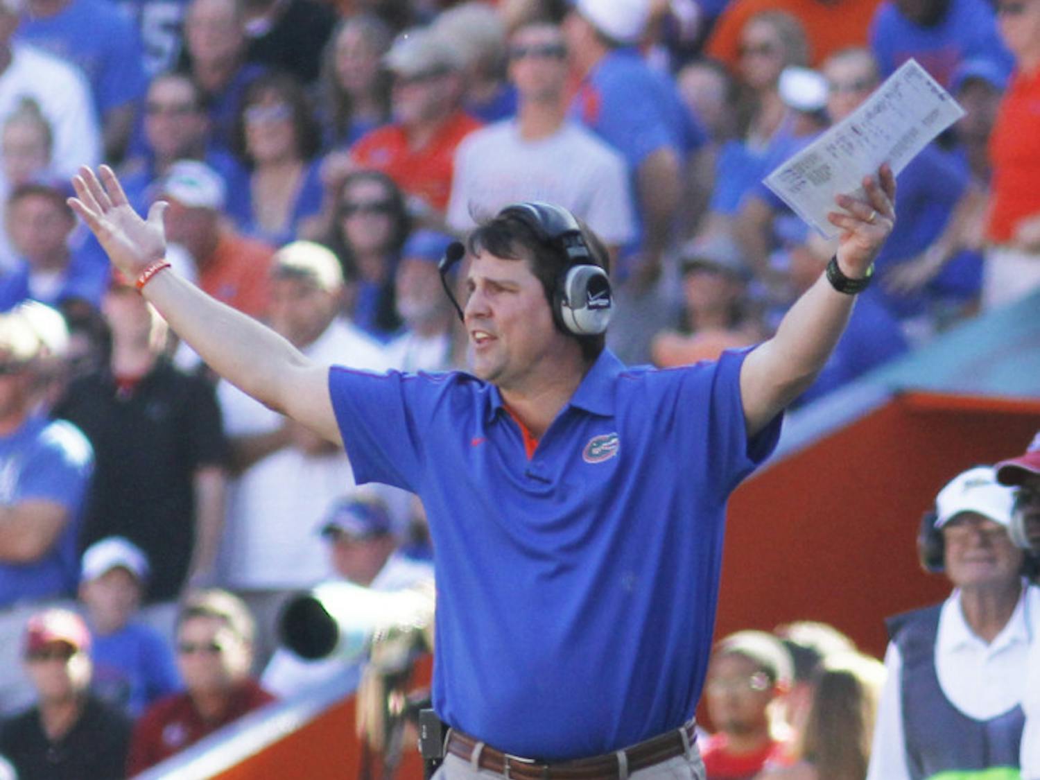 Coach Will Muschamp reacts to a call during UF’s 44-11 win against South Carolina on Saturday in The Swamp.
