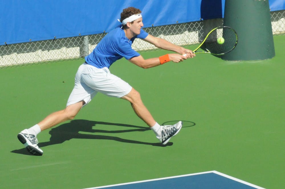 <p>Maxx Lipman returns a serve during Florida's 6-1 win over Troy on Jan. 17, 2016, at the Ring Tennis Complex.</p>
