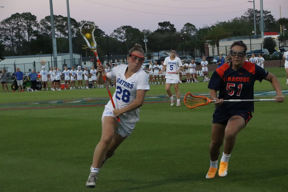 <p>Senior midfielder Maeson Tydings advancing the ball upfield. Florida lacrosse routed Stetson 19-5 Wednesday. Florida beat Eastern Carolina in the AAC Tournament Thursday.</p>