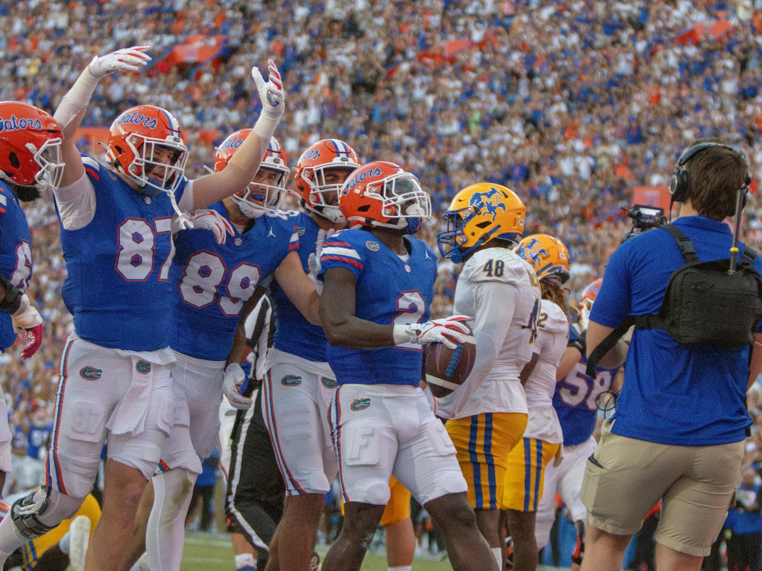 Junior running back Montrell Johnson Jr. celebrates after he scored a rushing touchdown in the Gators' 49-7 win against the McNeese State Cowboys Saturday, Sept. 9, 2023.