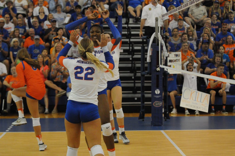 <p dir="ltr"><span>Allie Monserez (22) celebrates with teammate Rhamat Alhassan during Florida's Sept. 17, 2016, win over Marshall in the Lemerand Center.</span></p><p><span> </span></p>