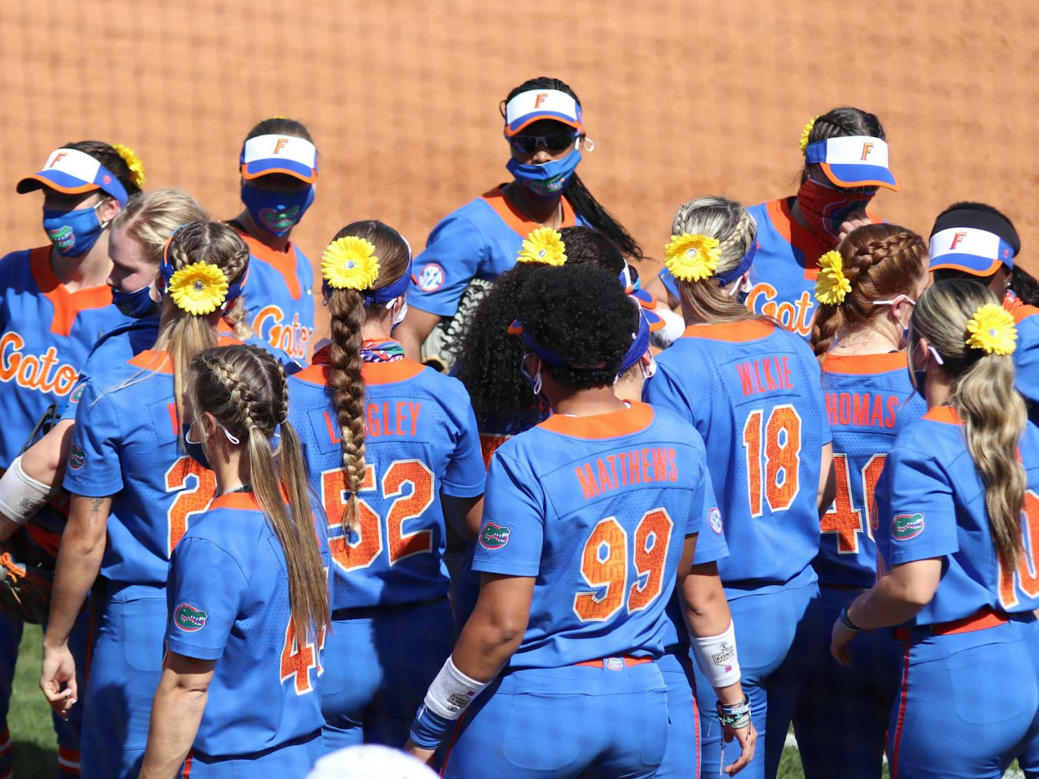 The Florida softball team during a game against Louisville Feb. 27, 2021. The Gators were edged by Mississippi State Sunday, 1-0 to drop game two of a three-game series.