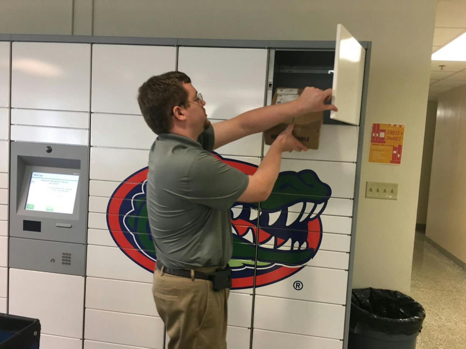 Nicholas Dunkel, an asset specialist with UF Housing, delivered some of the first packages to the Neopost lockers at Jennings.