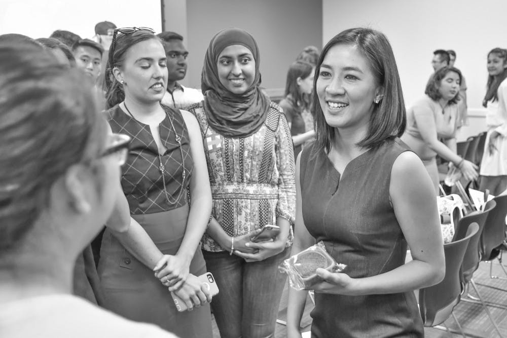 Michelle Kwan smiles as she talks to one of her fans. Kwan was on UF’s campus to kick off the Hillary Clinton campaign event on Thursday.