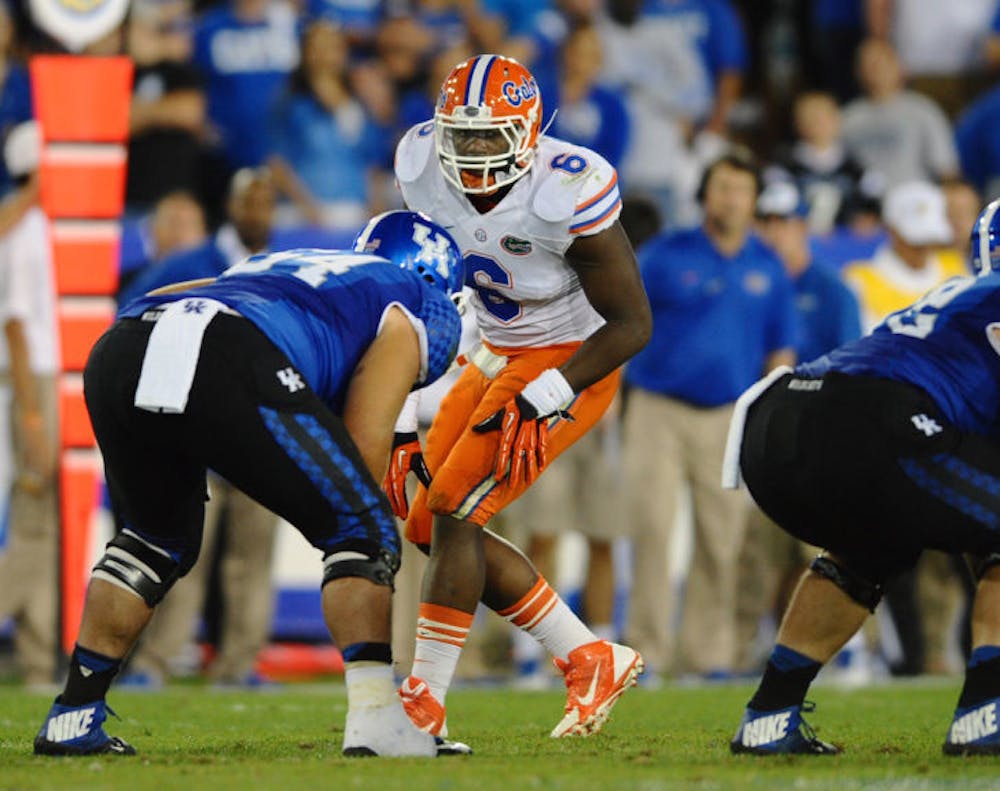 <p>Dante Fowler Jr. awaits a snap during Florida’s 24-7 win against Kentucky on Sept. 28, 2013, at Commonwealth Stadium. Fowler looks to become one of UF's leaders on defense this season.</p>
