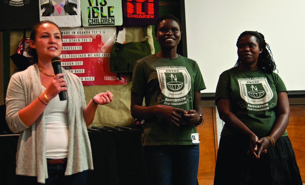 Belinda Smith, president of UF’s chapter of Invisible Children, introduces Monica Akello (left), a graduate of Awere Secondary School in Northern Uganda, to her mentor, Irene Aol, on Thursday.