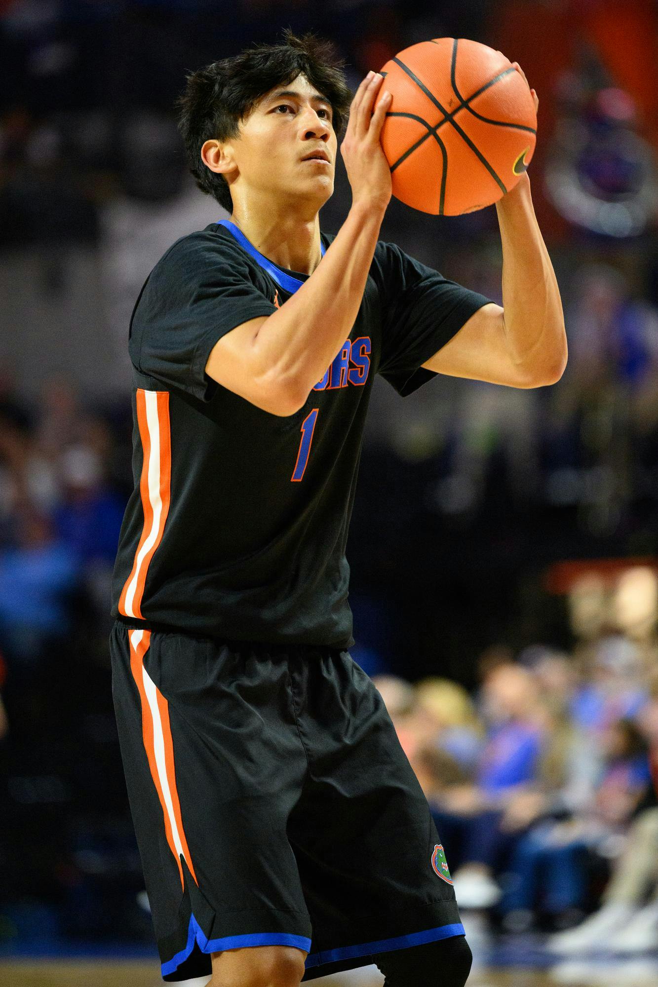 Florida guard Xaivian Lee (1) shoots a free throw during the second half of an NCAA college basketball game against Saint Francis, Wednesday, Dec. 17, 2025, in Gainesville, Fla.