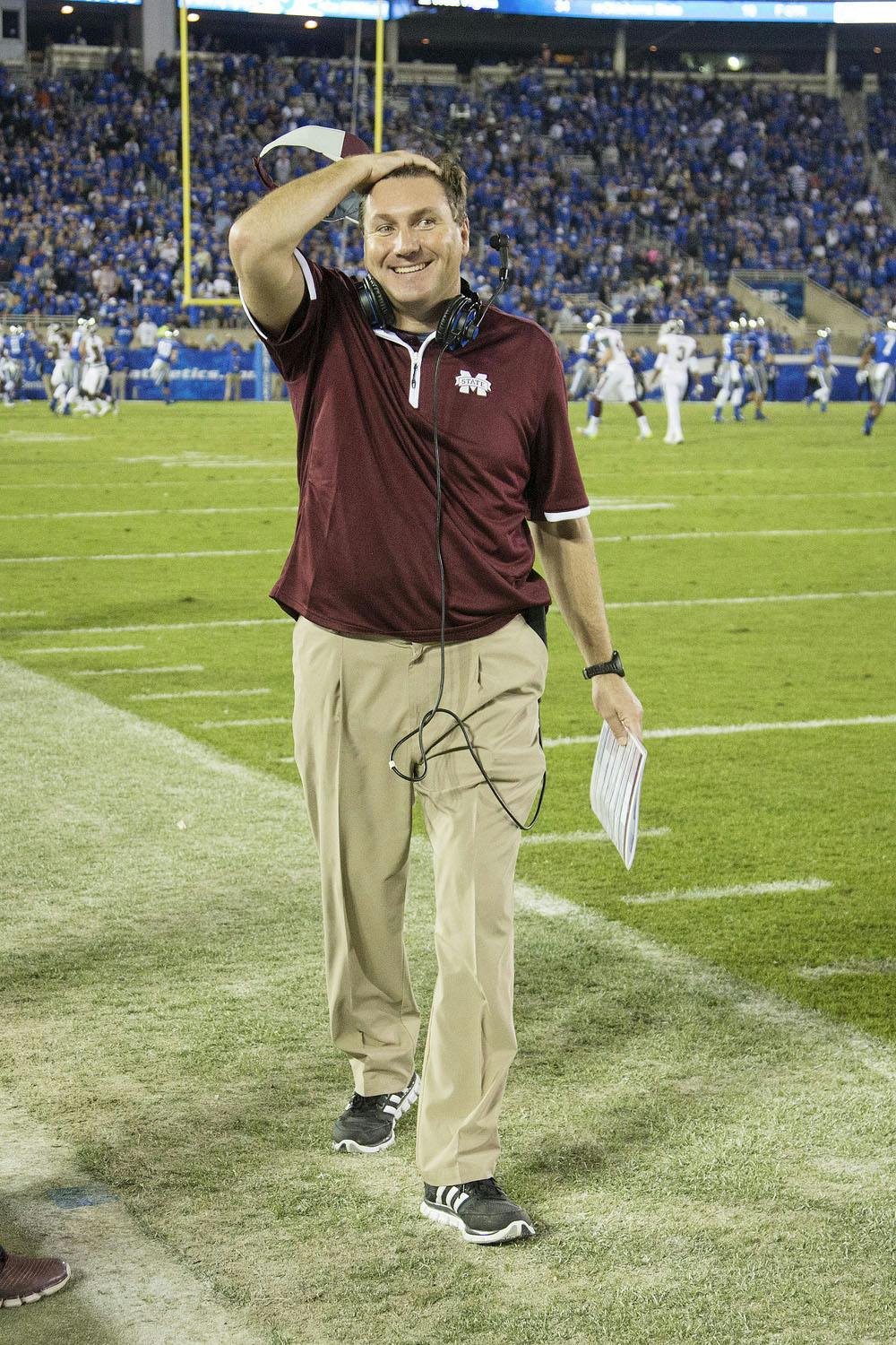 <p>Mississippi State head coach Dan Mullen smiles as the clock winds down during the second half of the Bulldogs' 45-31 win against Kentucky at Commonwealth Stadium in Lexington, Ky., on Saturday.</p>