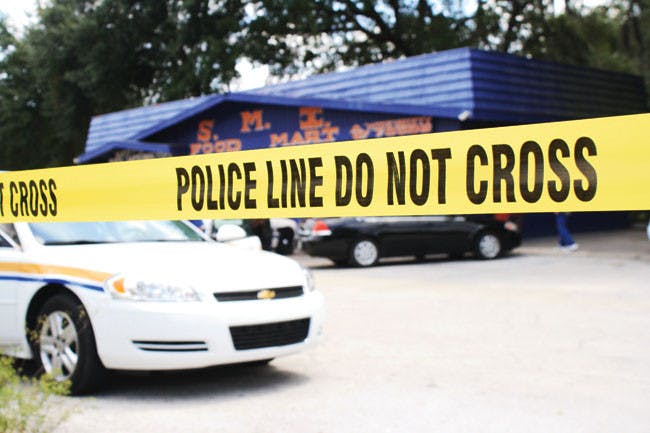 Gainesville Police officers searched the property of S.M.I. Food Mart and two other convenience stores Thursday. The stores are under investigation for extensive food stamp fraud.