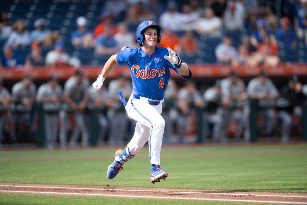 Florida Gators infielder Cade Kurland (4) sprints to first base in a baseball game against the Air Force Academy in Gainesville, Fla., on Friday, Feb. 15, 2025.