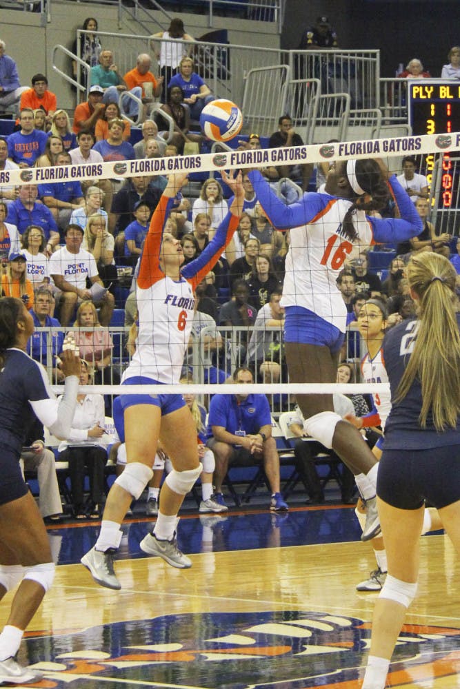 Mackenzie Dagostino (6) sets the ball during Florida's 3-0 win against Ole Miss on Sept. 28.