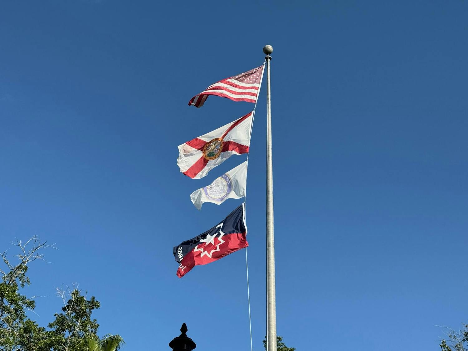 The Juneteenth flag, studded in red, white and blue, was raised in front of Gainesville City Hall on May 20, 2025.