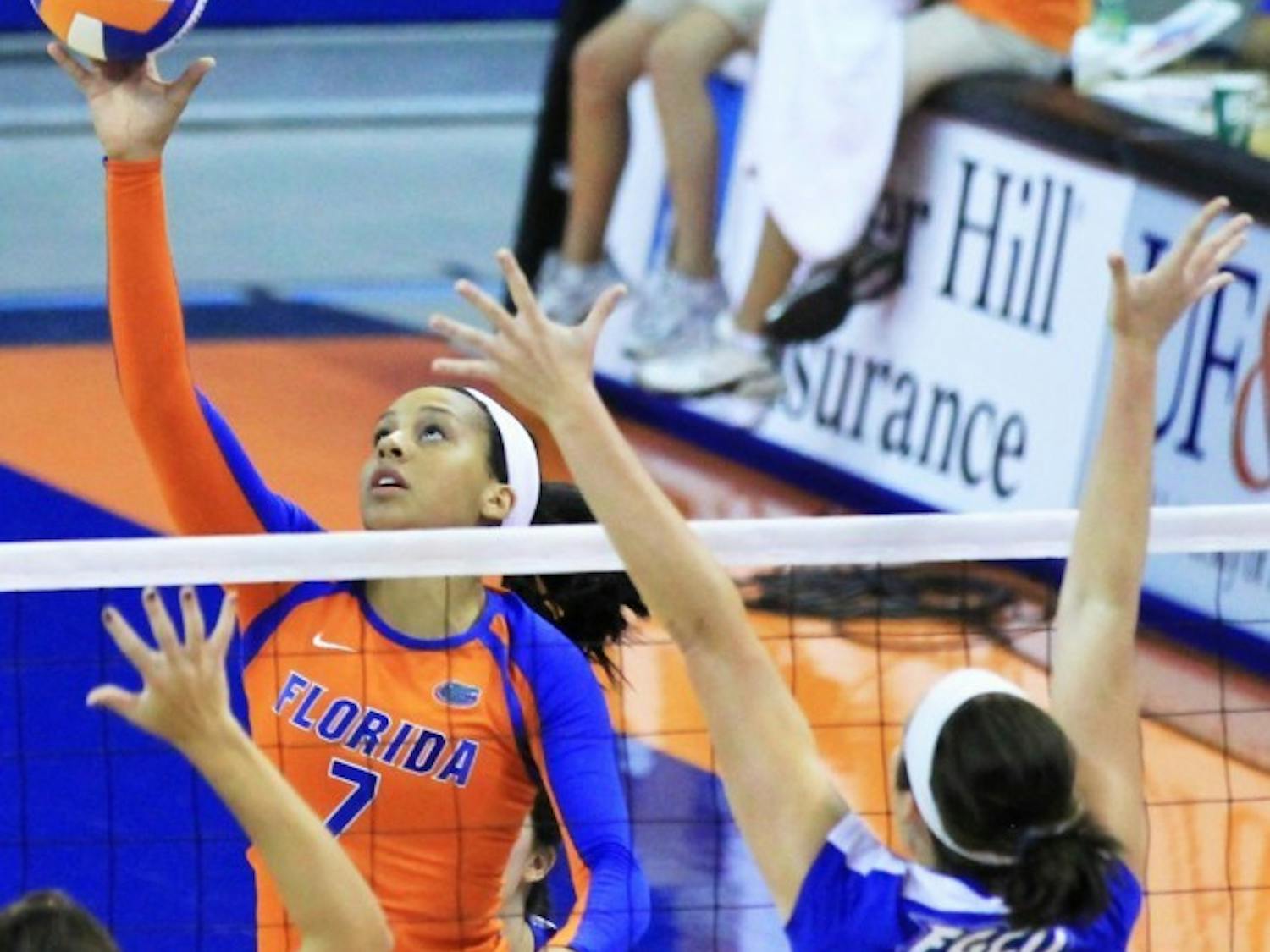 Gabby Mallette tips the ball over the net against Florida Gulf Coast at the Stephen C. O'Connell Center&nbsp;earlier this season. Despite having only one day to prepare for Kentucky, Mallette and fellow freshman Ziva Recek led Florida to a rare win in Lexington, Ky., on Sunday.