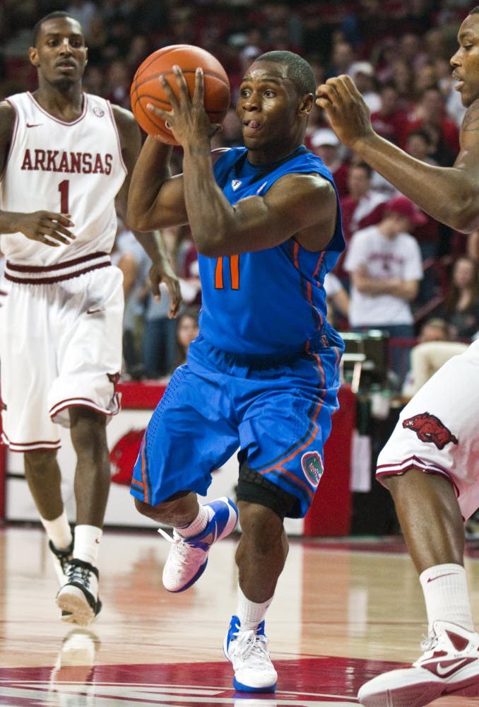 Florida point guard Erving Walker scored a career-high 31 points
in UF's 98-68 win against Arkansas on Saturday in Fayetteville,
Ark.