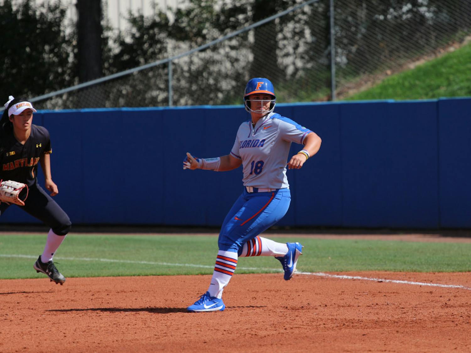 Left fielder Amanda Lorenz tied up the score in the bottom of the fifth inning with a 3-RBI triple in Florida's 5-3 victory over LSU.