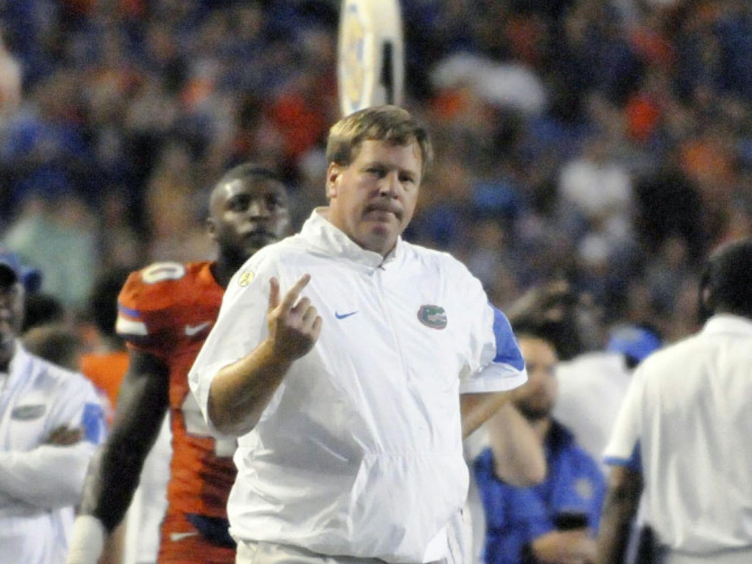 UF coach Jim McElwain stands on the sidelines during Florida's 31-24 win against East Carolina on Sept. 12, 2015, at Ben Hill Griffin Stadium.