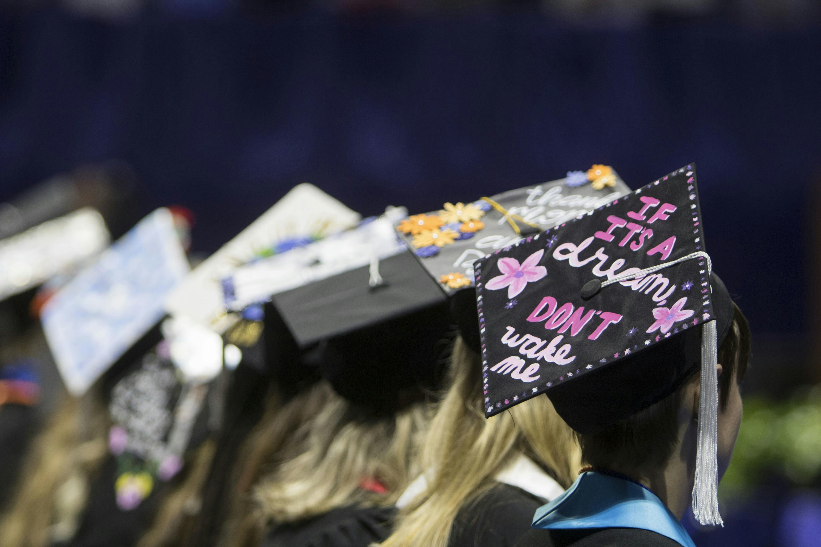 Leah Paxton waits alongside her fellow graduates Saturday morning during the class of 2019 commencement ceremony at the Stephen C. O’Connell Center. About 200 graduates attended for the College of Liberal Arts and Sciences ceremony, which was held two weeks after the original commencement at Ben Hill Griffin Stadium was cancelled due to poor weather conditions.