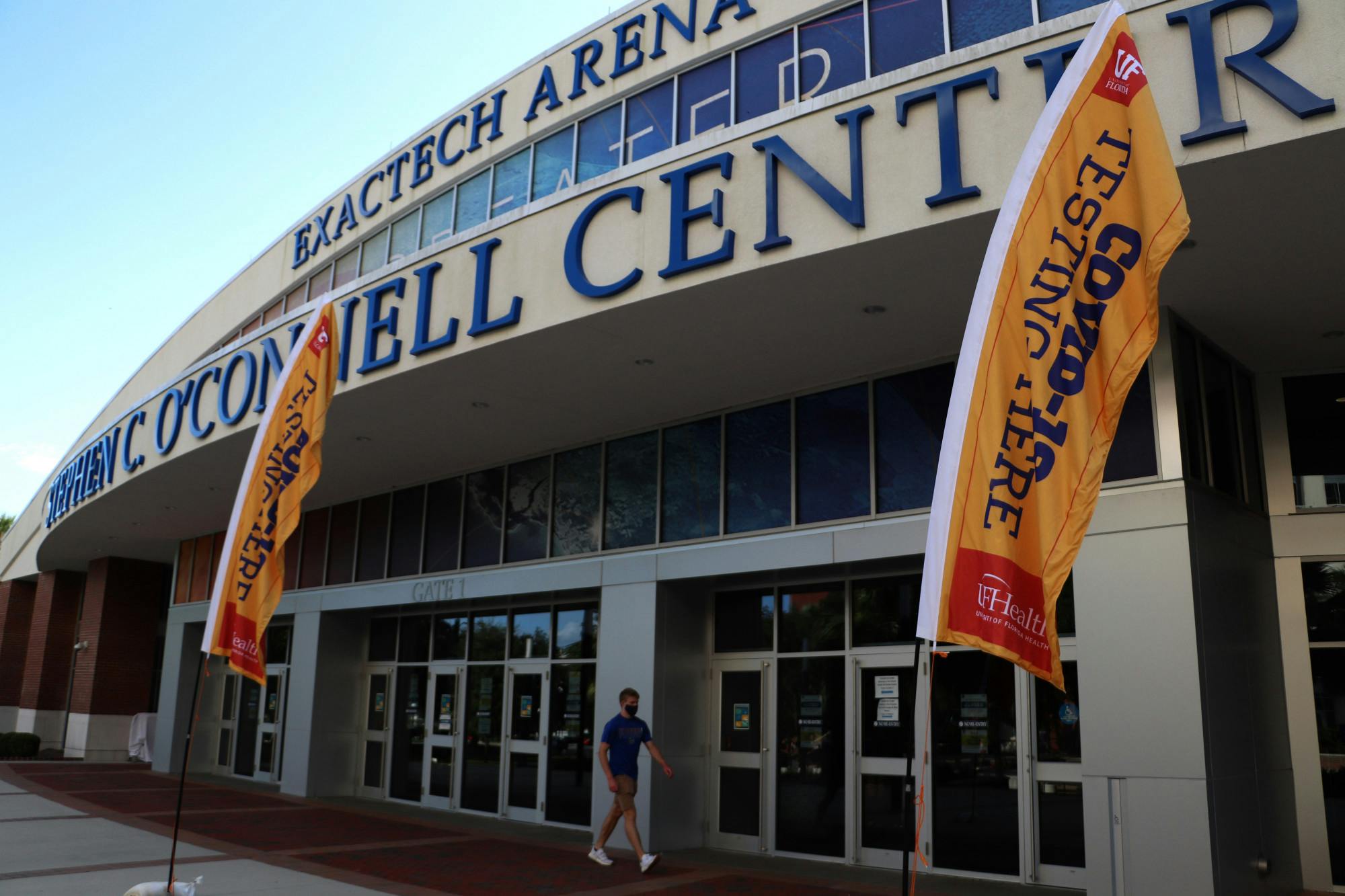 Christopher Dawes, 20, a UF health science sophomore and Tri Gators member, leaves the Stephen C. O'Connell Center after getting tested for Covid-19 on Wednesday, Sept. 23, 2020. 