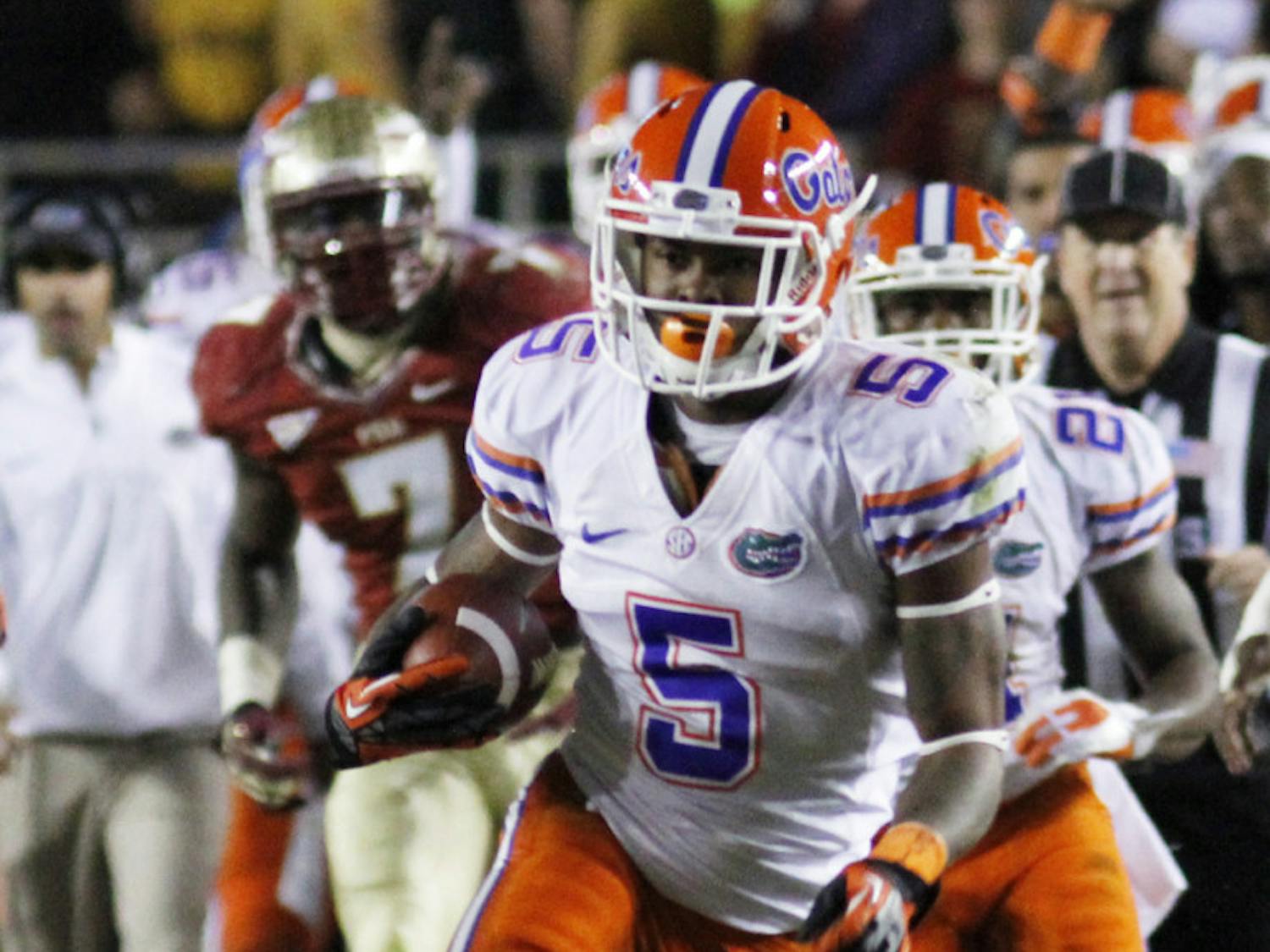 Marcus Roberson (5) takes the ball down the field during Florida's 37-26 win against Florida State at Doak Cambell Field in Tallahassee, Fla., on Nov. 24.