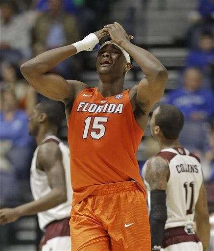Florida's John Egbunu (15) reacts after drawing his fifth foul during the second half of an NCAA college basketball game against Florida in the Southeastern Conference tournament in Nashville, Tenn., Friday, March 11, 2016. (AP Photo/Mark Humphrey)